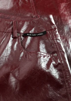 DAMES ALIX THE LABEL straight leg jeans faux leather pants