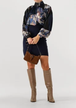 DAMES JANICE e minirok rodger